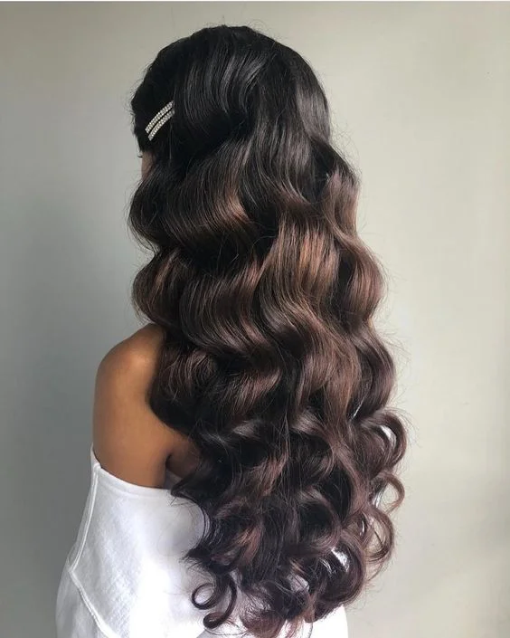 Professional stylists in Qatar doing amazing hairstyles for long hair