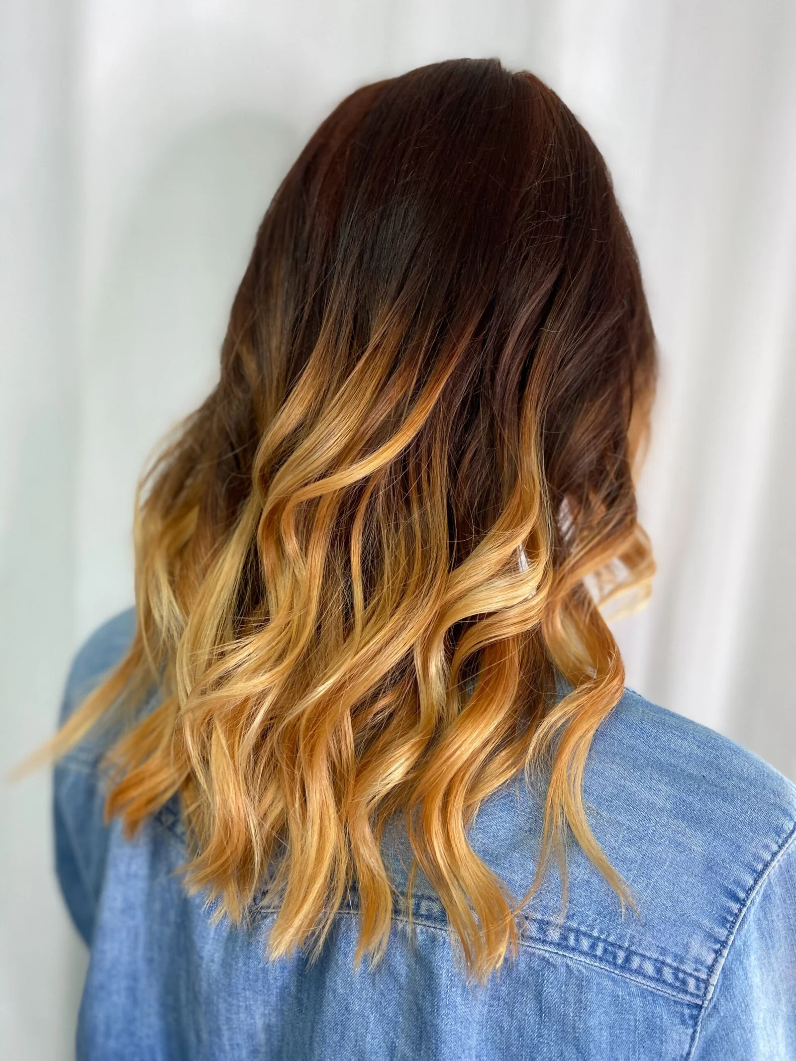 The perfect balayage/ombre done by professional stylists in Qatar.